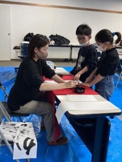 奈良東コープ委員会：冬休み子ども企画“書き初め”のための習字教室